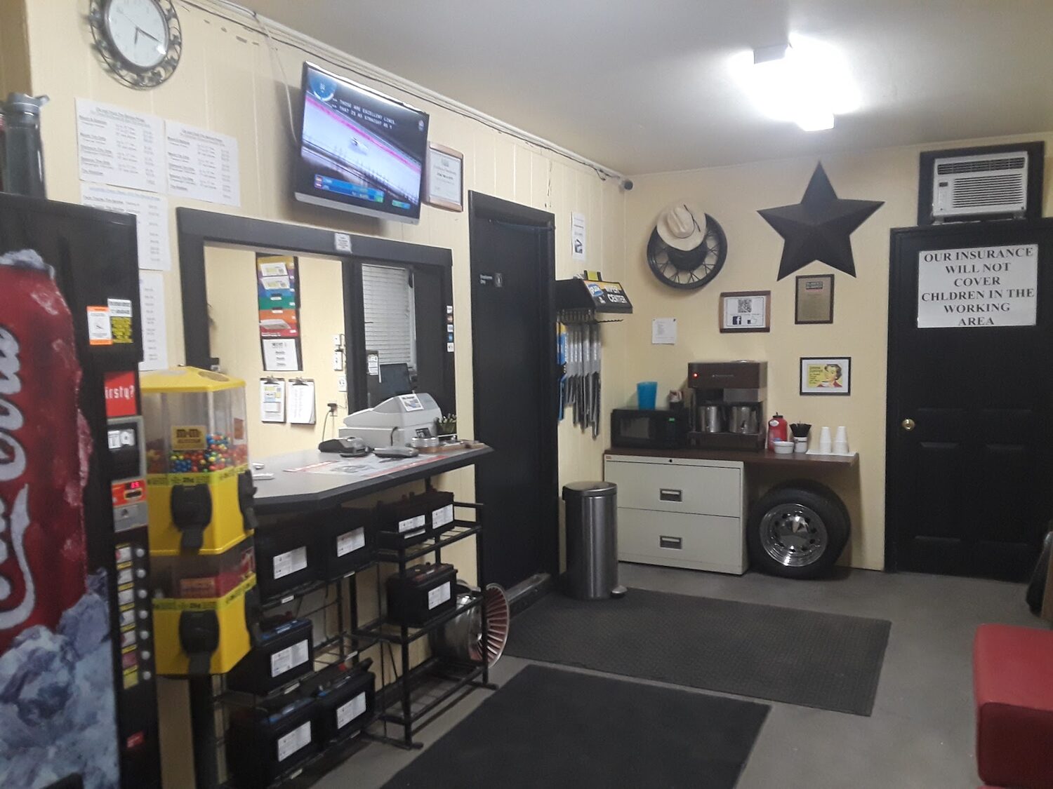 The Star Tire service counter with the posted price board